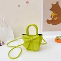 Mini bow shoulder bag in pale green PU leather with top handles and slender strap - Green