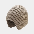 Detailed texture of khaki knitted beanie with earflaps and thick vertical rib pattern - Khaki