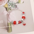 Detailed close-up of a silver snake chain bracelet with red beads and heart pendants - Red Heart Flower Style(2#)