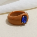 Retro resin ring with brown band and square blue gemstone centerpiece in a minimalist style - Brown