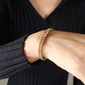 Elegante gouden armband met rechthoekige heldere kristallen om een damespols - 15+5cm / Champagne Armband