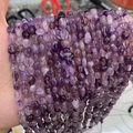 Handheld strands of irregular natural purple amethyst beads with polished finish - Purple Crystal