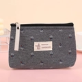Mini neceser de lona en gris oscuro con estampado floral y etiqueta de estilo natural handmade - Floral / Gris floral