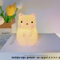 Cute yellow cat night light in soft silicone with warm glowing effect for kids - Pink Cat