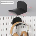 Widened black curved pegboard hook for headsets on black wall mount storage system - Curved Headphone Hook - Black