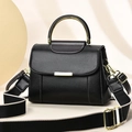Chic black litchi pattern leather square handbag with golden handle and woven strap - Black