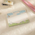 Flat lay of cute cartoon landscape sticky notes with a pink pen and stapler on paper - Green Landscape Illustration Style