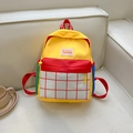 Kids color-block canvas backpack in red, yellow, and blue for school or travel - Yellow Patchwork