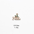 Detail view of Noel Christmas pendant showing 15x19mm size and holly enamel design - No.24 NOEL Holly Pendant