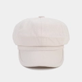 Detail of light beige octagonal hat showing breathable cotton-linen woven texture and button - Off White