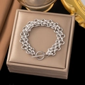Silver multi-layer circular chain bracelet with T-bar clasp on a leather jewelry box - AE168 Watchband Bracelet Steel