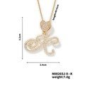 Detail of gold K initial pendant with heart bail and pavé cubic zirconia settings - Cursive Letter K Style (N00203J-X--K)