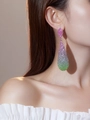 Luxurious drop earrings with pink purple green gradient rhinestones on model - Rose Pink Green Gradient