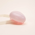 Portable egg-shaped detangling hair brush in matte gradient pink finish - Solid Pink