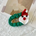 Handmade knitted Christmas hair clip featuring a green base with a cute Santa Claus motif - Hollow Oval Santa Claus Hair Clip