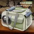 Portable pet carrier bag in fresh green with a transparent capsule window and mesh panels - Green