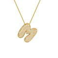 Close-up of 18K gold plated letter H pendant with micro-pave cubic zirconia crystals - Letter M / Gold