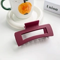 Matte wine red rectangular hollow hair claw clip styled with minimalist aesthetic decor - 10.5cm / Burgundy