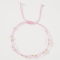 Pink woven rope bracelet with crystal beads and gold accents and adjustable sliding knot - Pink