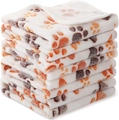 Stacked soft flannel pet blankets with colorful paw prints and reinforced edges - Beige Paw Print