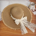Beige straw beach hat featuring white lace bow, pearl accents, and frayed tassel edges - D-425 Khaki Frayed Brim Hat / M (56-58cm)