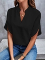 Detail of a casual black V-neck short sleeve blouse with lightweight fabric on a model - S / Tops / Black