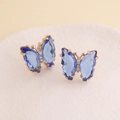 Close-up of golden butterfly earrings with dark blue wings and micro-pave diamond details - Blue (6#)