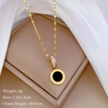 Detail showing Roman numerals on gold titanium necklace pendant with cubic zirconia - Titanium Steel / Gold Black Style (T404)