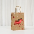 Detalle de bolsa de regalo de Navidad en papel kraft con trineo rojo y copos de nieve - 025-4 Trineo / 27x21x11cm