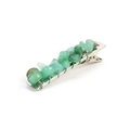 Close-up of handmade green crystal chips wrapped on a silver metal alligator hair clip - Green Aventurine