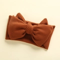 Macro shot of waffle-knit texture and handmade double-layered bow on baby headband - 17*9 cm / Brown