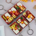 Miniature Taiwan bento box keychain featuring realistic rice, meat and egg fillings - Random Bento (No Keychain)