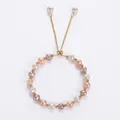 Detail of baroque freshwater pearl bracelet with multi-color beads and adjustable gold clasp - Colorful