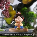 Traditional Tang lady figurine in yellow hanfu holding Fu plaque on stone base - Fortune Character Phone Holder