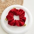 Detail of red velvet scrunchie with golden bells on white dish for Christmas - Gold Bell Decoration / Wine Red with Bells