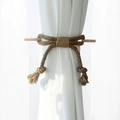 Hand-woven bow-shaped curtain tieback in brown linen rope with a natural wooden stick - Jute Natural Bow Style