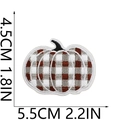 Detailed size view of gingham pumpkin embroidery patch with grid measuring 5.5cm by 4.5cm - US 8