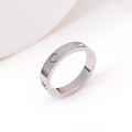 Detail of silver titanium ring featuring a hollow heart and two small crystals - US 9 / Three Hearts Three Diamonds / Steel