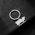 Macro shot of silver Puerto Rico map keychain with polished finish on black surface - Steel E
