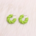 Exaggerated C-shaped twisted hoop earrings in vibrant lime green matte finish - Fruit Green Twisted