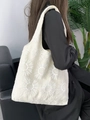 White canvas tote bag with 3D sunflower embroidery worn by model in minimalist interior - Sunflower Embroidery with Canvas Lining