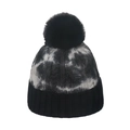 Close-up of tie-dye knit beanie with large faux fur pompom and black ribbed cuff - M (56-58cm) / Black