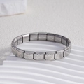 Macro detail of Italian charm bracelet links with heart engravings in stainless steel - Solid Heart Silver (BD-24)