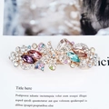 Floral butterfly hair clip with colorful crystals and gold-plated alloy finish - Colorful