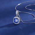 Silver-plated necklace with a square blue gemstone pendant surrounded by white diamonds - Blue Diamond Xl-82 [comes With Box And Chain]