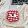 Detailed view of red and white checkered plush pouch on soft lamb wool background - Cat Square Sanitary Bag