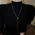 Close-up of silver Y-shaped long necklace with spherical pendant on black sweater - Silver Ball Adjustment Style (22#)