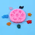 Pink 8cm round silicone mold for ocean themes featuring starfish shells and fish shapes - 50-3268 Round Ocean Life Mold (55g) / Pink