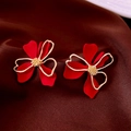 Detailed close-up of red and gold floral vintage stud earrings on a dark silk fabric - 36# Silver Earring Post - Gold - Red - 3D Painted Flower
