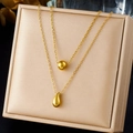 Detail of gold-plated double-layer necklace with polished bead and teardrop pendants - Gold Layered Ball 3D Waterdrop Pendant (N4082)